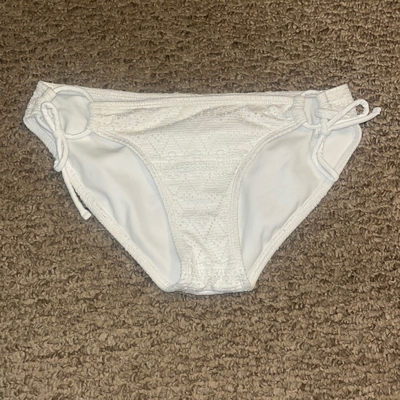 Never worn. Cute tie up swim trunks. - Picture 1 of 2